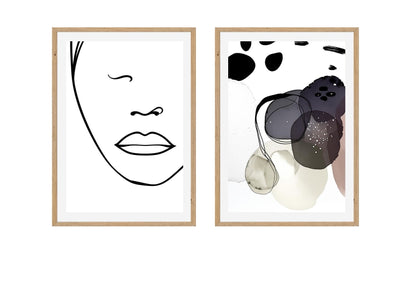 Minimalist Diptych Wall Art Set: Continuous line art face and an abstract expressionist print with dark shapes, displayed over a gold sofa in a modern living room.