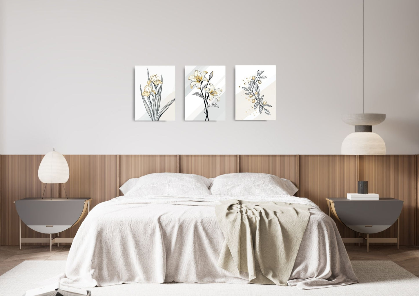 A set of three modern canvas displayed above a bed. Each features simple black line art drawings of different botanicals (lilies, etc.) with subtle abstract shapes and pale yellow/gold accents on a white background. Canvas wall art by wall and more