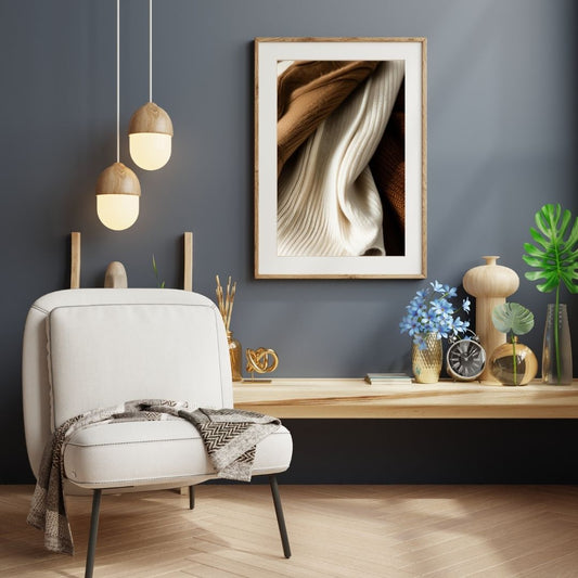 Vertical framed Minimalist Textile Photography print capturing soft, wavy folds of Brown, Beige, and Cream Wool Fabric. Ideal Scandinavian or Bohemian Living Room Decor accent.