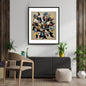 Vertical framed Abstract Mixed Media Collage print featuring a vibrant cluster of fragmented, layered shapes and textures in Black, Red, Blue, and Yellow. Ideal Contemporary or Eclectic Living Room Decor.