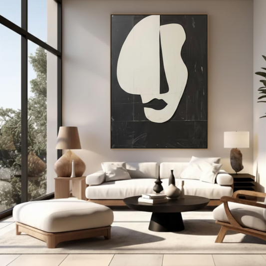 Black and white abstract face wall art displayed in a modern living room, featuring minimalist shapes and a contemporary design in a modern living room.