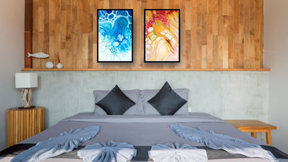 Abstract Fluid Art Diptych Wall Art Set (2 framed prints): contrasting blue and vibrant orange/red Pour Painting. Ideal for Modern Bedroom Decor or Coastal interiors.