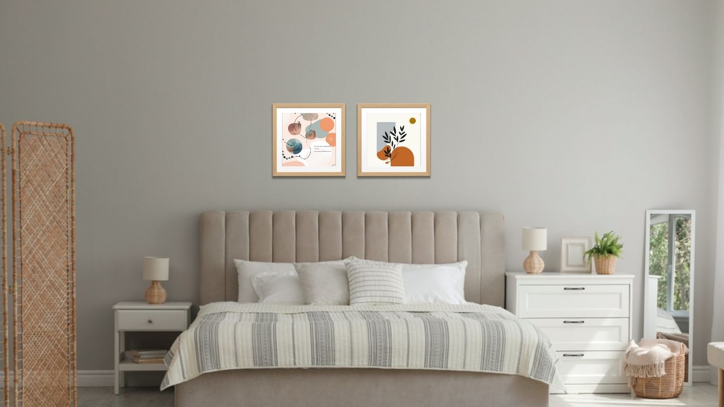 A diptych of two contemporary abstract artworks in a cohesive palette of burnt orange, dusty blue-gray, and peach. The left piece features overlapping watercolor-like organic shapes, delicate black lines, and dots on a pale pink background. The right piece features solid, flat shapes and a silhouette of a dark green botanical branch against a pale background with a burnt orange sun, by wall and more