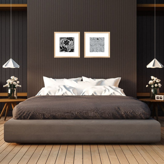 Monochromatic Botanical Diptych Framed Wall Art Set (2 square prints) featuring Stylized Black and White Flower Illustration and a subtle moth/butterfly pattern. Ideal Minimalist or Modern Bedroom Decor.