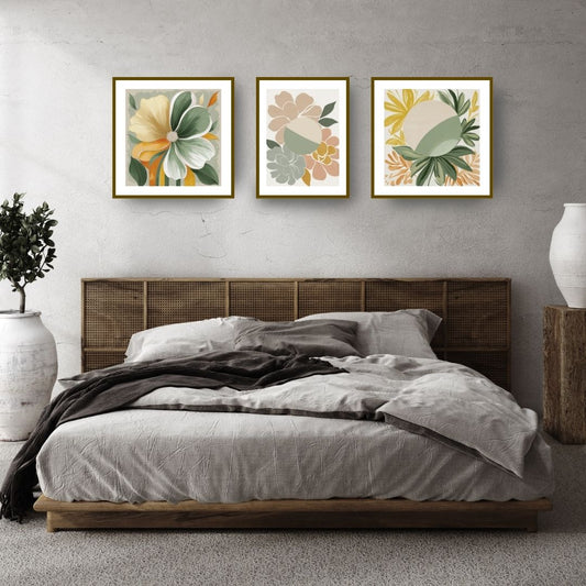 Contemporary Floral Triptych Wall Art Set (3 framed prints) featuring stylized, abstract Flower Blooms in Sage Green, Yellow, and Peach. Ideal Bohemian Bedroom Decor or Modern Living Room.