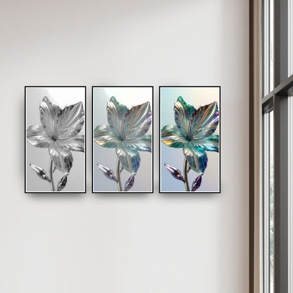 Iridescent Botanical Triptych Wall Art Set (3 framed prints) featuring abstract Semi-Transparent Flowers with a glass-like texture, shifting from black/white to vibrant Teal and Green hues. Ideal Modern or Luxury Bedroom Decor.